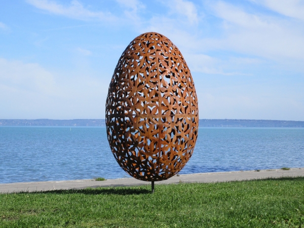 Rusty egg garden sculpture